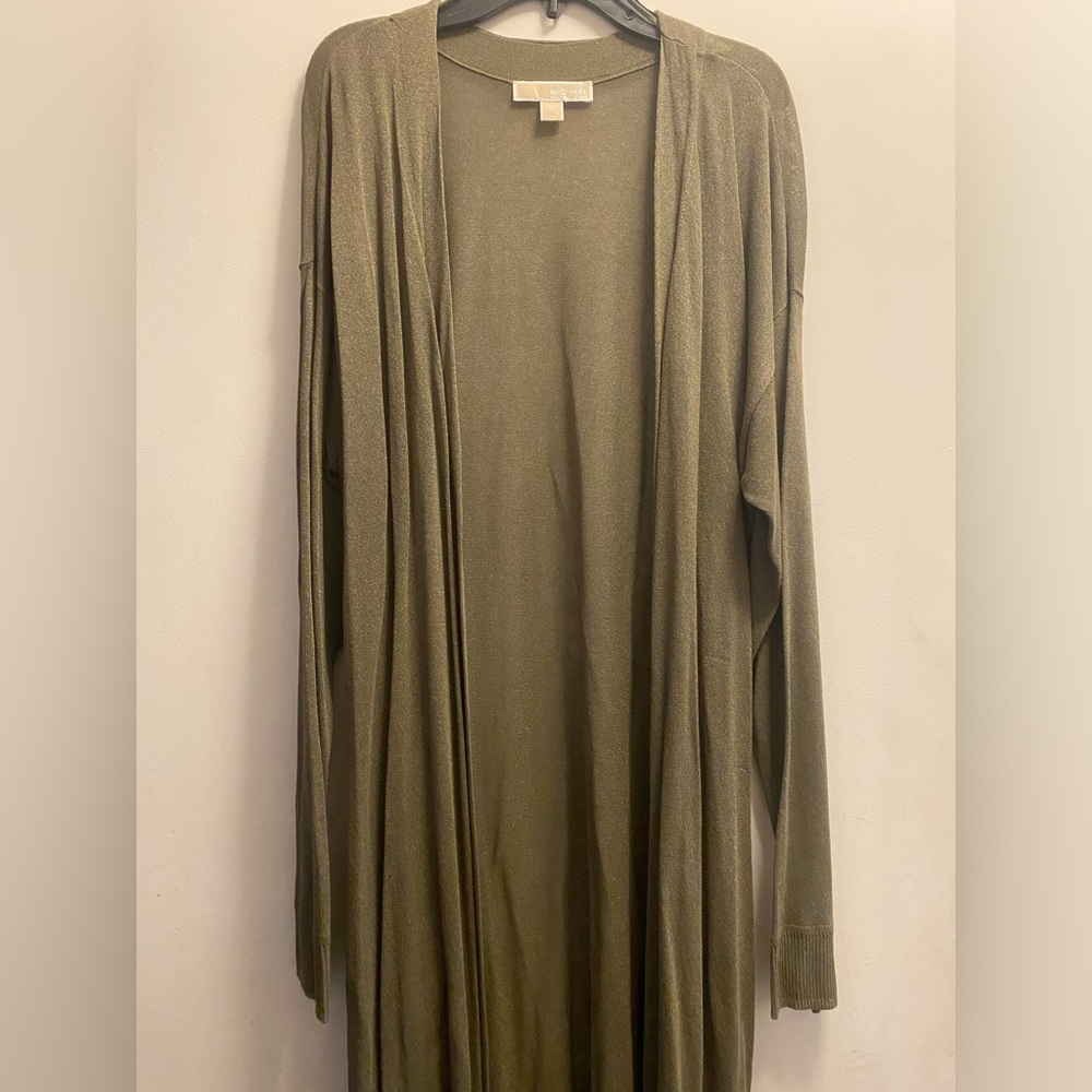 Size -XL condition-Great never worn. Sparkle green cardigan Long